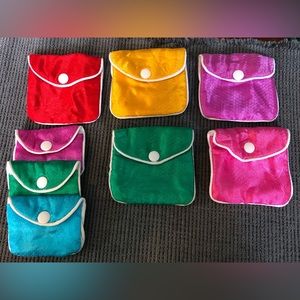 Jewelry pouch bags with snap closure.